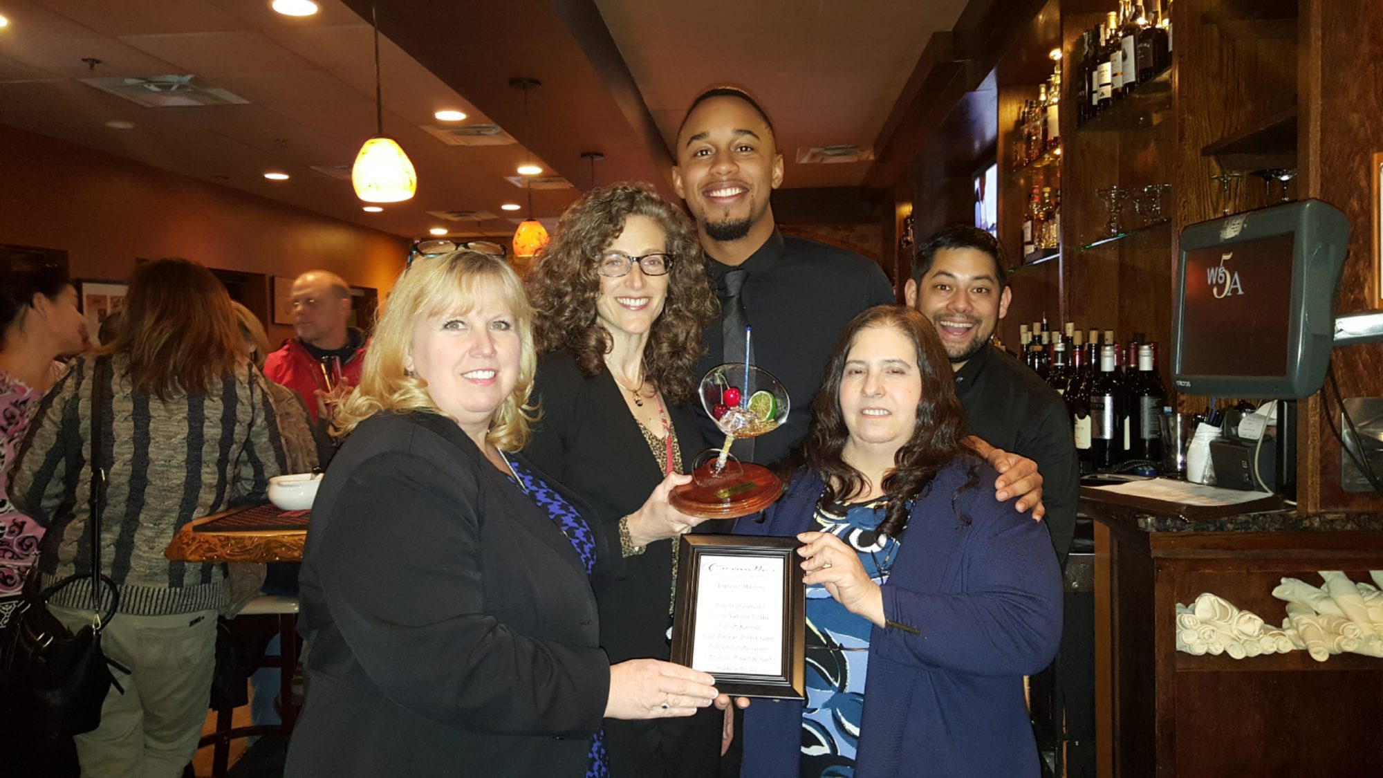 Karen Cohen and Kris Spitler with Monza staff and manager, Gabby